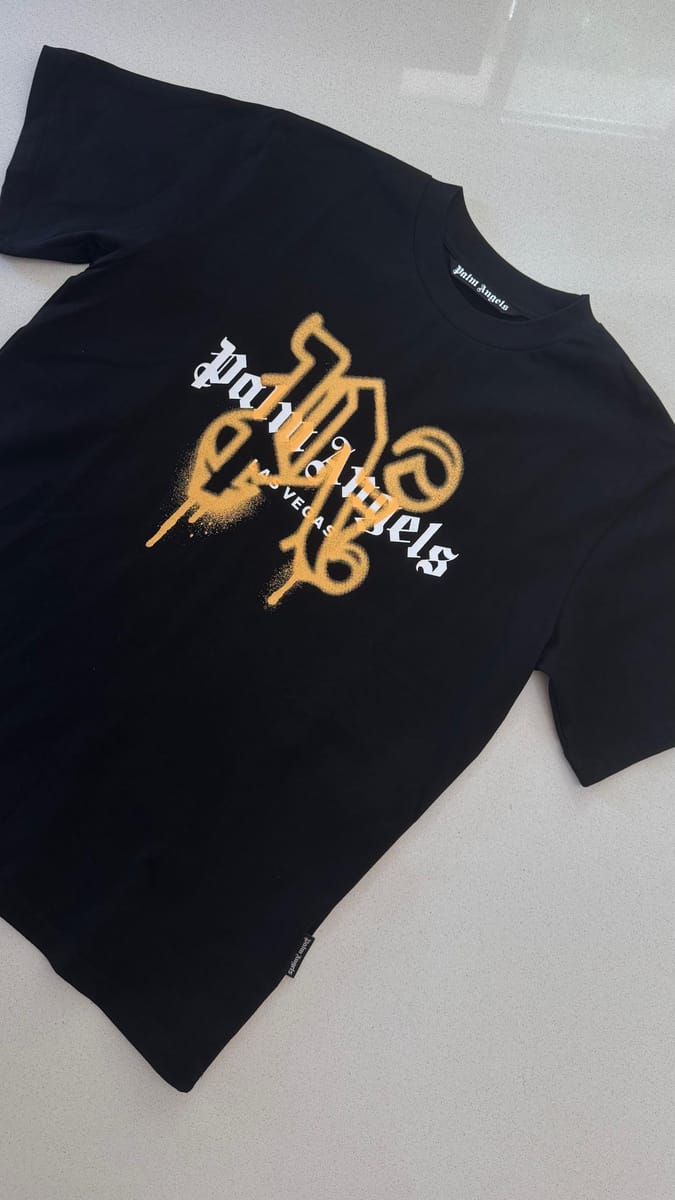 Palm Angels Las Vegas Monogram Spray Tee "Negro / naranja"